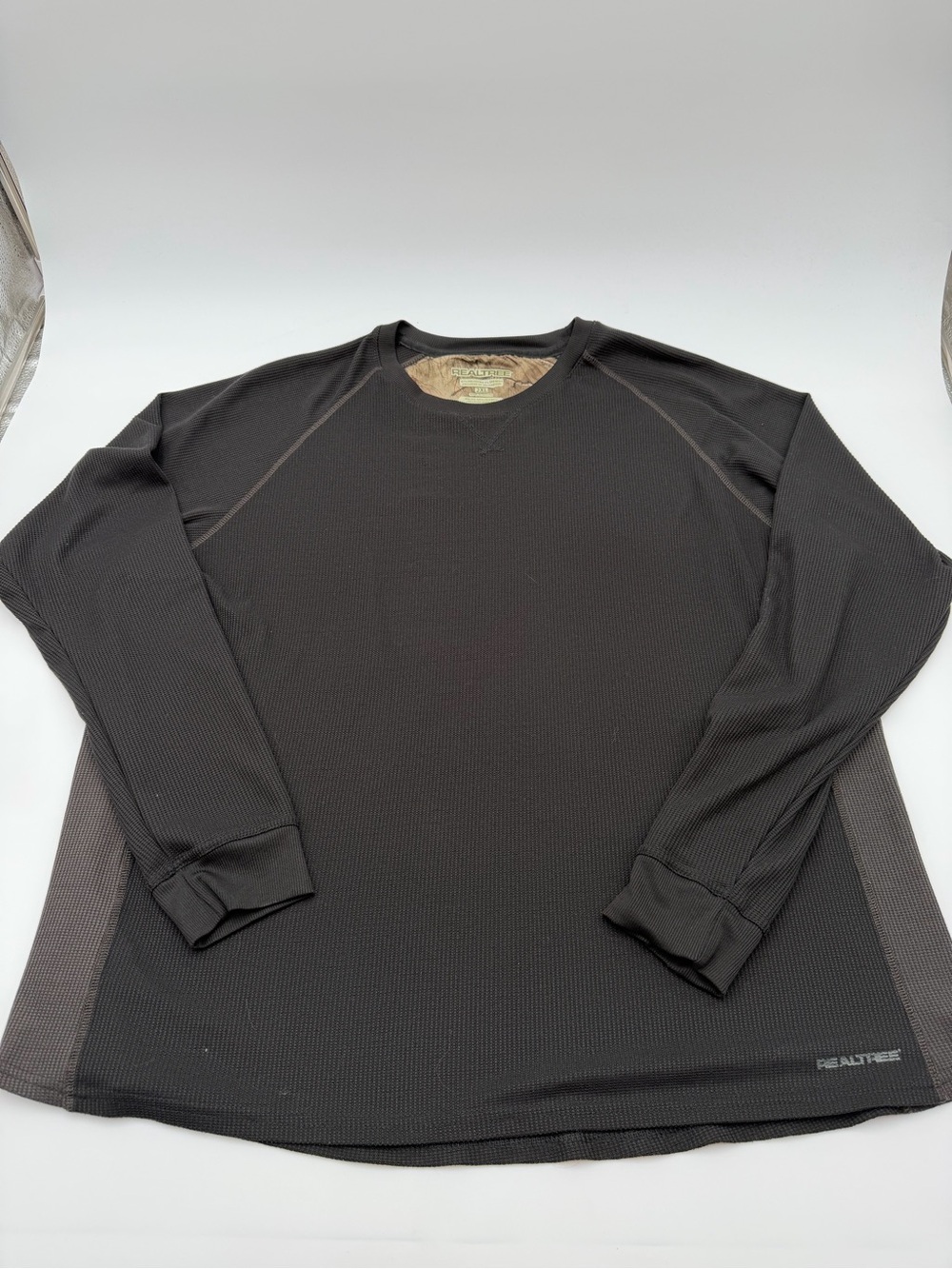 Men’s Realtree branded black thermal shirt with a textured waffle-knit fabric 2X